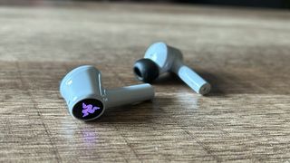 Razer Hammerhead Hyperspeed earbuds on side to show touch controls