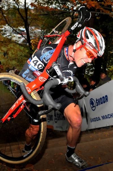 Jonathan Page (Planet Bike) shoulders his bike.