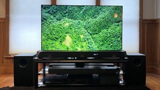 Nakamichi Dragon system with TV showing green landscape