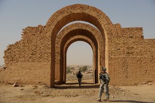 U.S. Soldiers from Crazy Horse Troop, 1st Squadron, 3rd Armored Cavalry Regiment provide security for the Provincial Reconstruction Team and representatives of United Nations Educational, Scientific, and Cultural Organization visiting the ancient city of