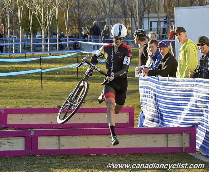 Mike Garrigan (Van Dessel/POC/Shimano) over the barriers