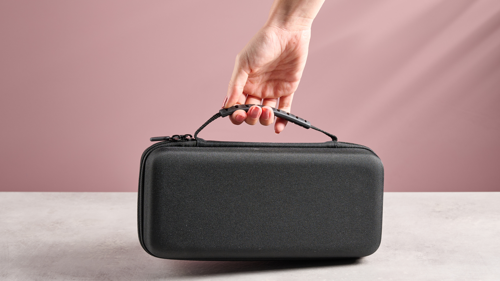 Person lifting the Nacon Protection Case XL for Nintendo Switch 2
