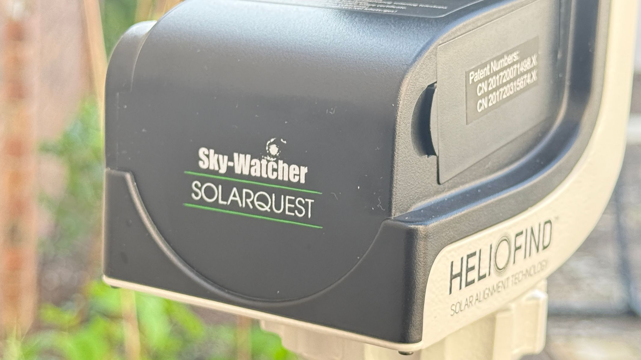 A close-up of the Sky-Watcher SolarQuest solar telescope mount showing the Sky-Watcher SolarQuest logo.