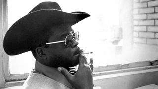 Otis Blackwell in cowboy hat, smoking, c. 1970