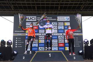 OOSTENDE BELGIUM JANUARY 31 Podium Aniek Van Alphen of The Netherlands Silver Medal Fem Van Empel of The Netherlands Gold Medal World Champion Jersey Blanka Vas Kata of Hungary Bronze medal Celebration Mask Covid Safety Measures during the 72nd UCI CycloCross World Championships Oostende 2021 Women U23 UCICX CXWorldCup Ostend2021 CX on January 31 2021 in Oostende Belgium Photo by Luc ClaessenGetty Images