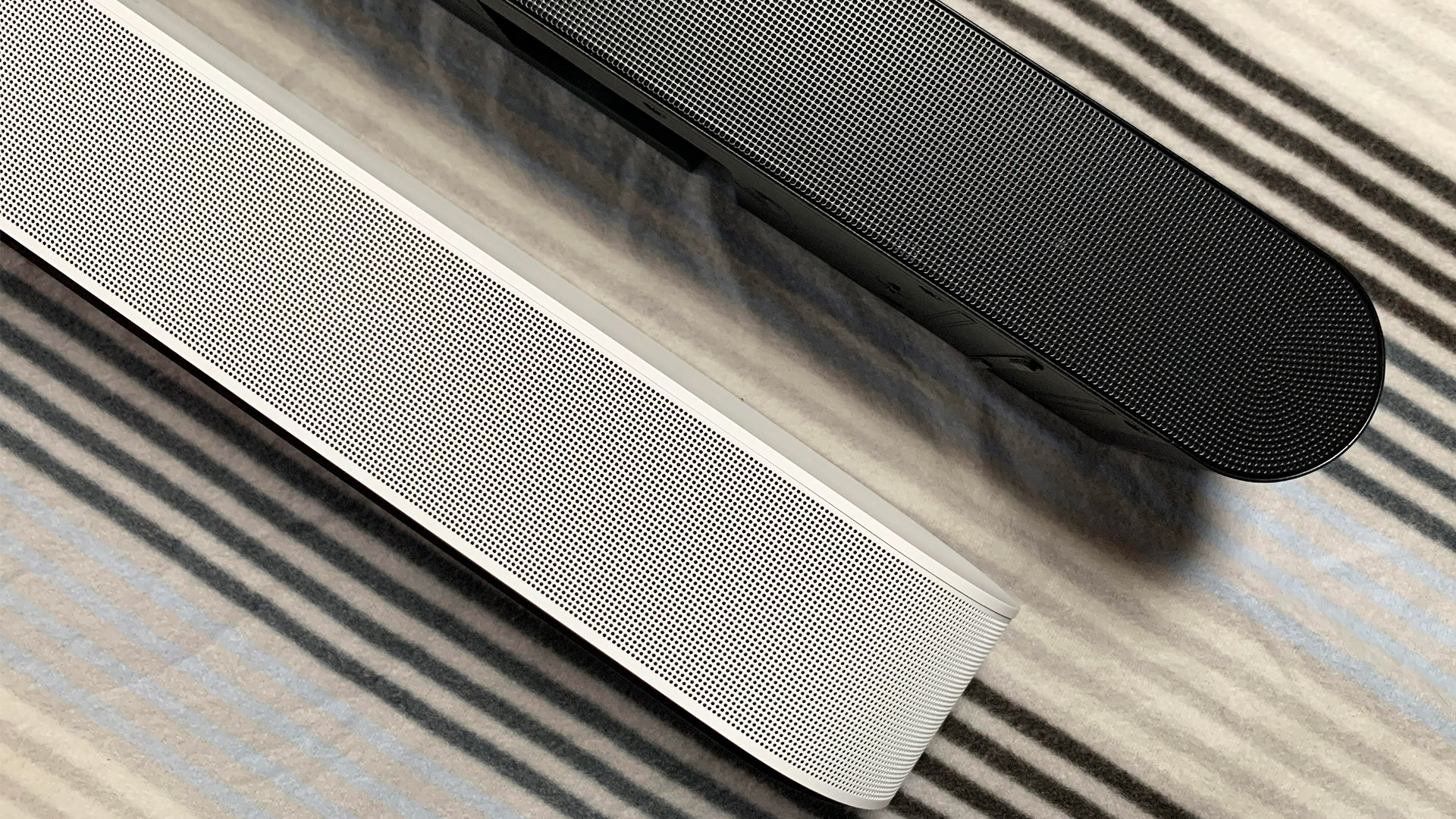 The Sonos Beam Gen 2 next to the Samsung HW-S60B