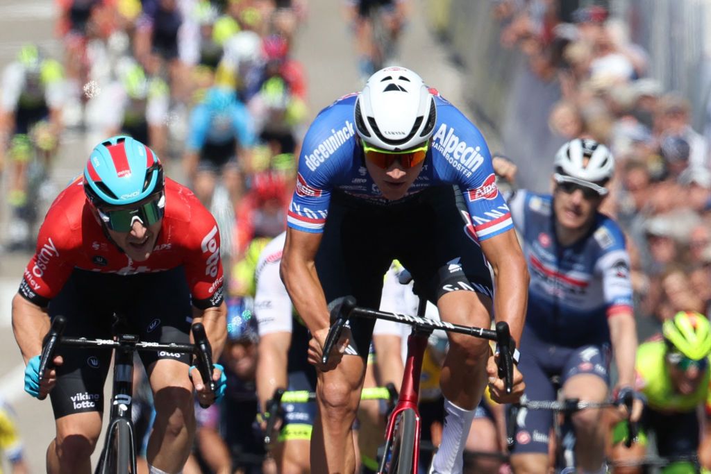 Dutch Mathieu van der Poel of AlpecinDeceuninck and Dutch Fabio Jakobsen of Soudal QuickStep L sprint to the cross the finish line ofthe second stage of the Baloise Belgium Tour cycling race from Merelbeke to KnokkeHeist 1757km on June 15 2023 Photo by DAVID PINTENS Belga AFP Belgium OUT Photo by DAVID PINTENSBelgaAFP via Getty Images