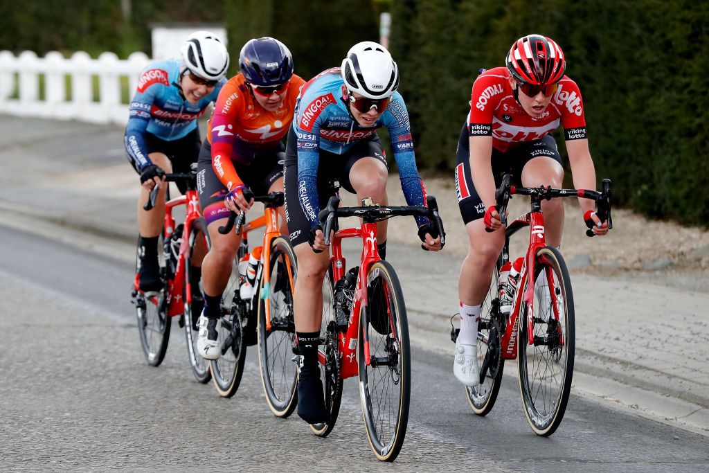 OUDENAARDE BELGIUM APRIL 03 LR Naomi De Roeck of Belgium and Team Bingoal CasinoChevalmeire DoltciniVan EyckProximus Ct Makayla Macpherson of United States and Team Human Powered Health Lotte Popelier of Belgium and Team Bingoal CasinoChevalmeire DoltciniVan EyckProximus Ct and Katrijn De Clercq of Belgium and Team Lotto Soudal Ladies compete in the chase group during the 19th Ronde van Vlaanderen Tour des Flandres 2022 Womens Elite a 1586km one day race from Oudenaarde to Oudenaarde RVV22 RVVwomen on April 03 2022 in Oudenaarde Belgium Photo by Bas CzerwinskiGetty Images