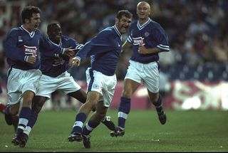 Muzzy Izzet, Emile Heskey, Ian Marshall and Matt Elliott of Leicester City celebrate during the UEFA Cup First Round match at the Vincente Calderon in Madrid, Spain. Athletico Madrid won the match 2-1. \ Mandatory Credit: Ben Radford/Allsport