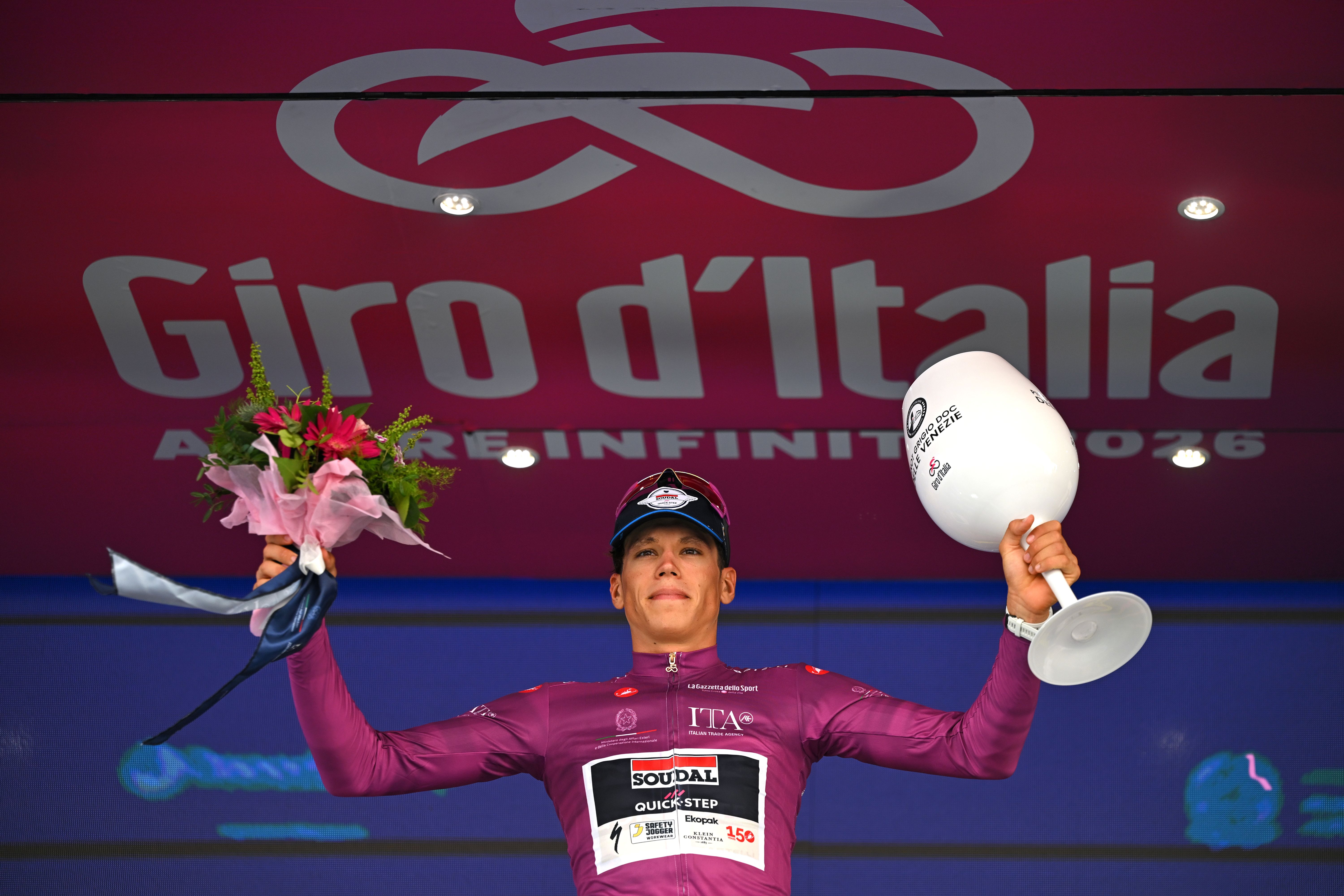 MILAN, ITALY - MAY 24: Paul Magnier of France and Team Soudal Quick-Step celebrates at podium as - Purple Points Jersey during the 109th Giro d'Italia 2026, Stage 15 a 157km stage from Voghera to Milan / #UCIWT / on May 24, 2026 in Milan, Italy. (Photo by Tim de Waele/Getty Images)