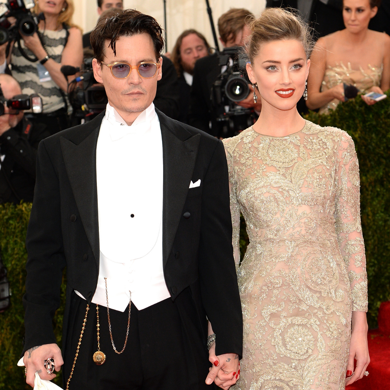 Johnny Depp and Amber Heard attend the "Charles James: Beyond Fashion" Costume Institute Gala 2014