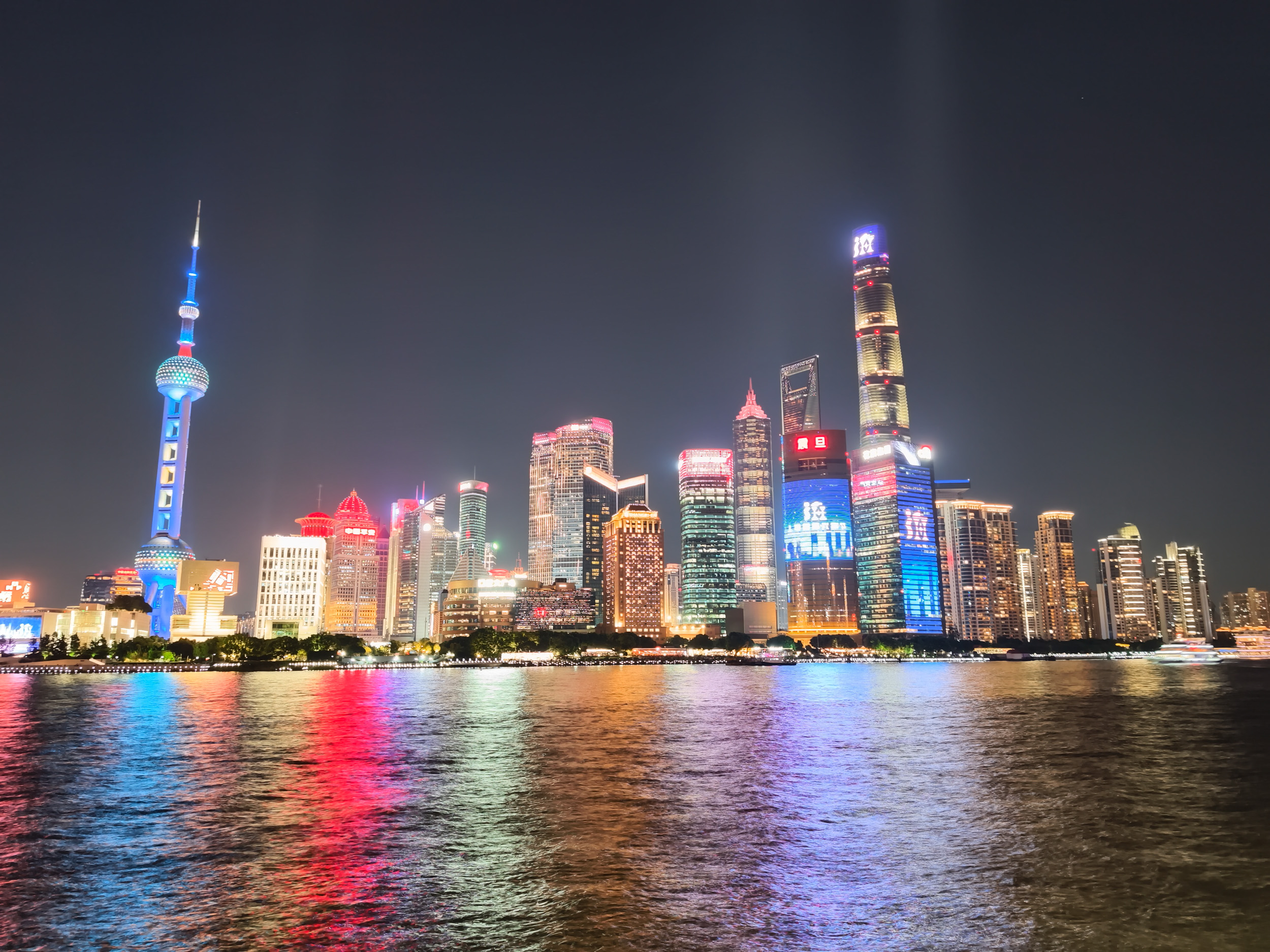 The famous Bund skyline over the Haungpu river in Shanghai, at night