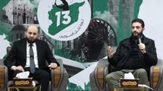 Syrian rebel leaders Mohammed al-Bashir and Ahmed al-Sharaa