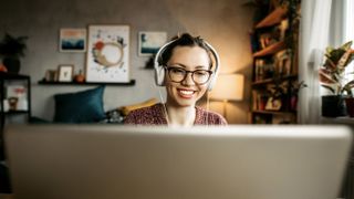 A woman working from home with cutting-edge hardware