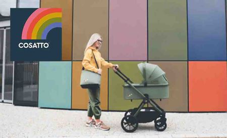 Cosatto logo placed over a woman pushing a pram in front of mixed colourful wall