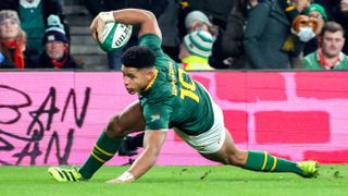 Sacha Feinberg-Mngomezulu of South Africa dives over to score his side's fourth try during the Quilter Nations Series 2025 match between Ireland and South Africa at the Aviva Stadium in Dublin.
