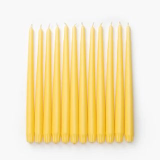12 yellow taper candles