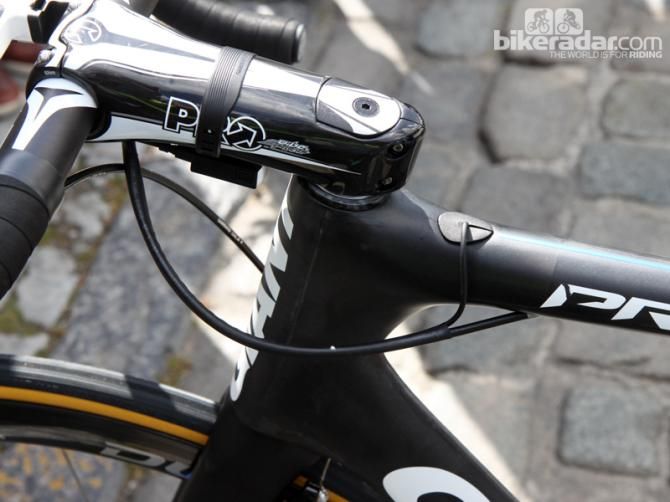 Giant-Shimano mechanics use heat shrink tubing to clean up the cable routing