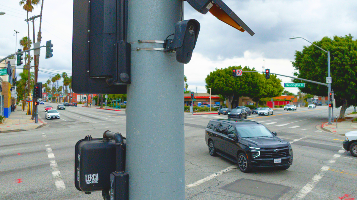 Photo of autonomous vehicle, VR headset, electric car