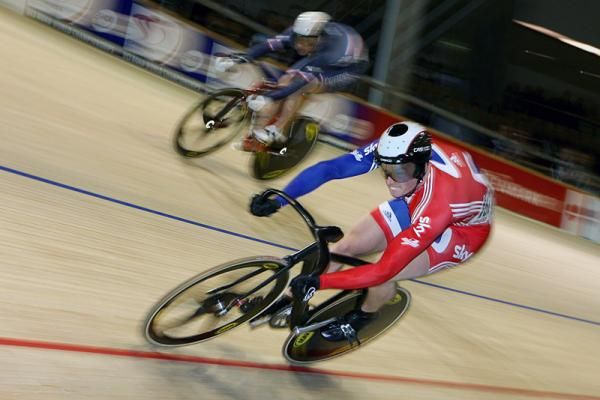 Matt Crampton (Great Britain) attacks Francois Pervis (France) in the 1/8 final of the men's sprint.