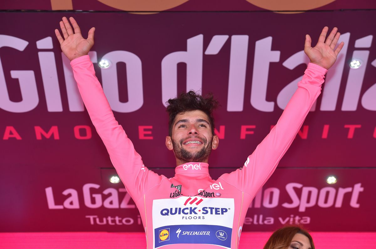 A beaming Fernando Gaviria on the podium
