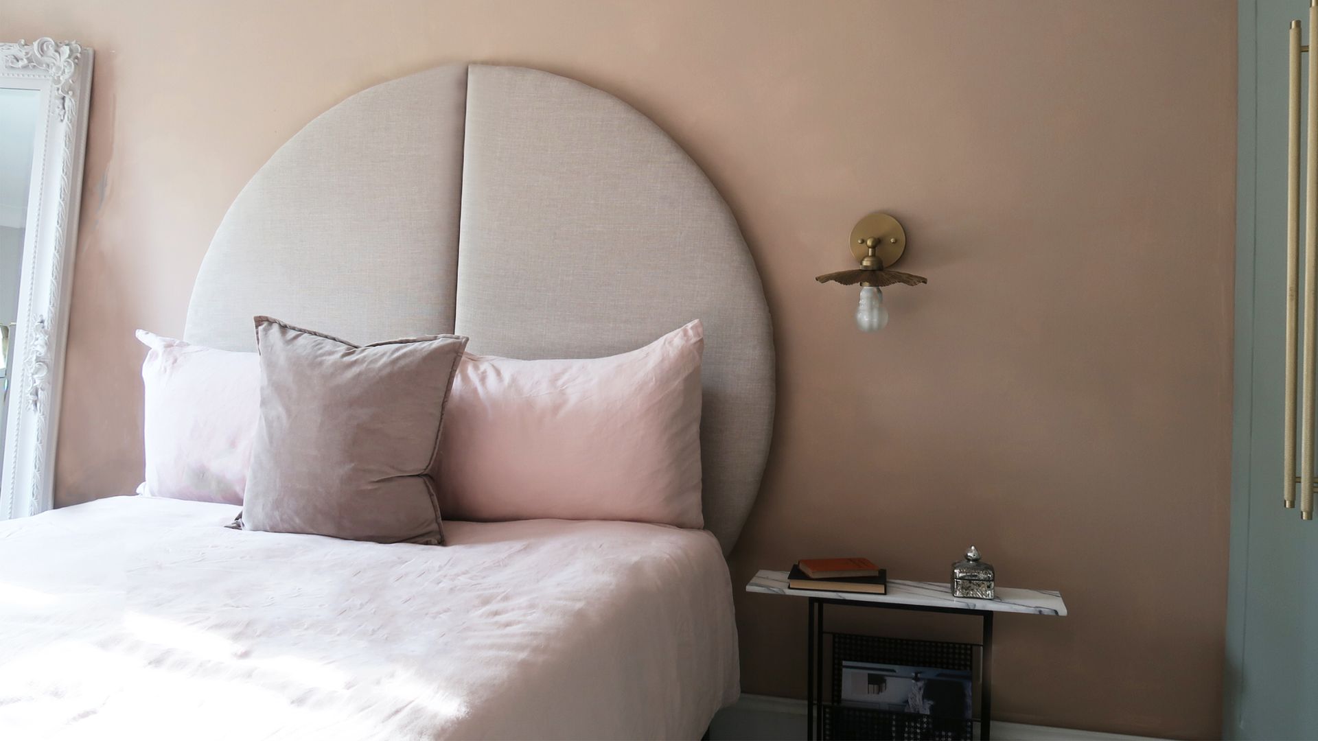 This oversized upholstered headboard looks designer, and takes 5steps