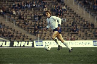 Hans-Jurgen Dorner in action for East Germany against Italy in 1982.