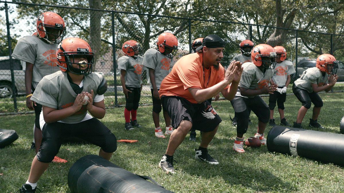 Coach Gawuala (9U Coach) with the 9U team in Netflix&#039;s &#039;We Are: The Brooklyn Saints&#039;.