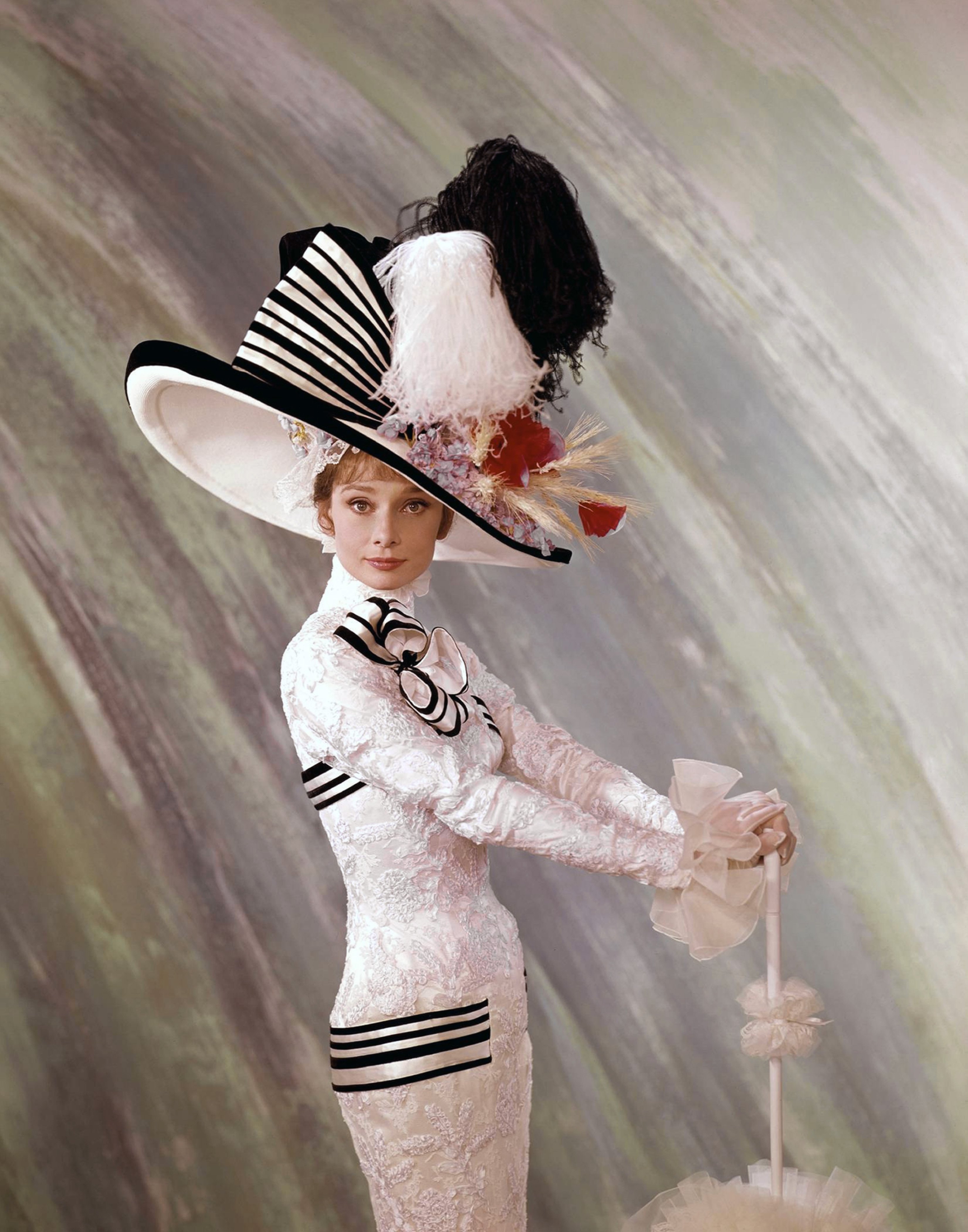 Audrey Hepburn in an elaborate costume for the film &#039;My Fair Lady&#039;