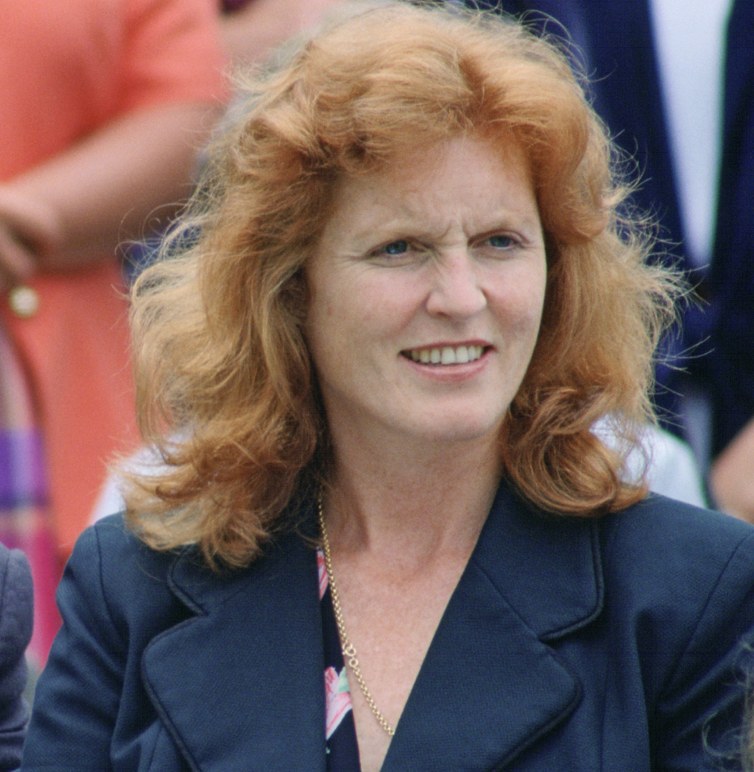 Sarah Ferguson and Prince Andrew sitting next to each other at a school sports day in 1993