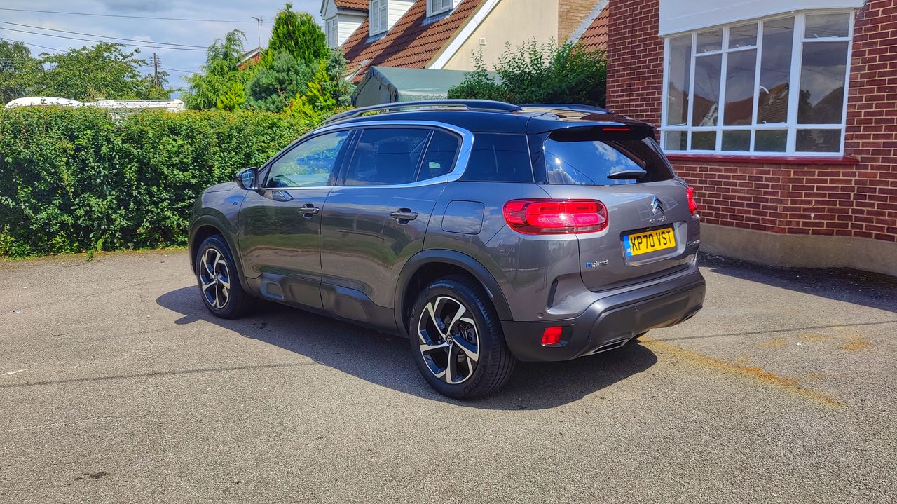 Angled rear view of Citro&euml;n C5 AirCross parked outside a house