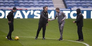 Gerrard and Saturday's referee inspect the Ibrox pitch
