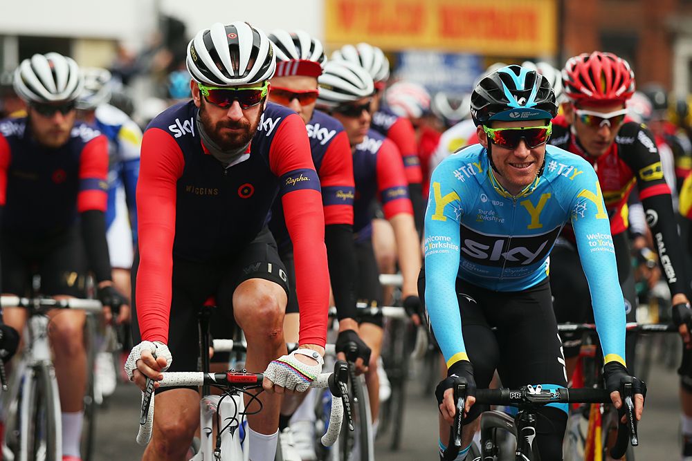Wiggins and Nordhaug off the start line during stage 2
