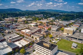 An aerial view of Downtown of Dalton under a blue sky with tiny clouds in Georgia