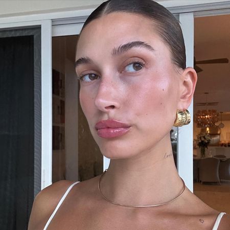 Hailey Bieber selfie with glowing skin 