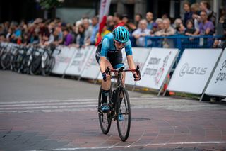 Brenna Wrye-Simpson racing with DNA Pro Cycling on the road