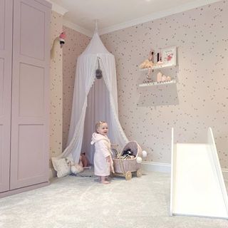 kids room with toys and slide