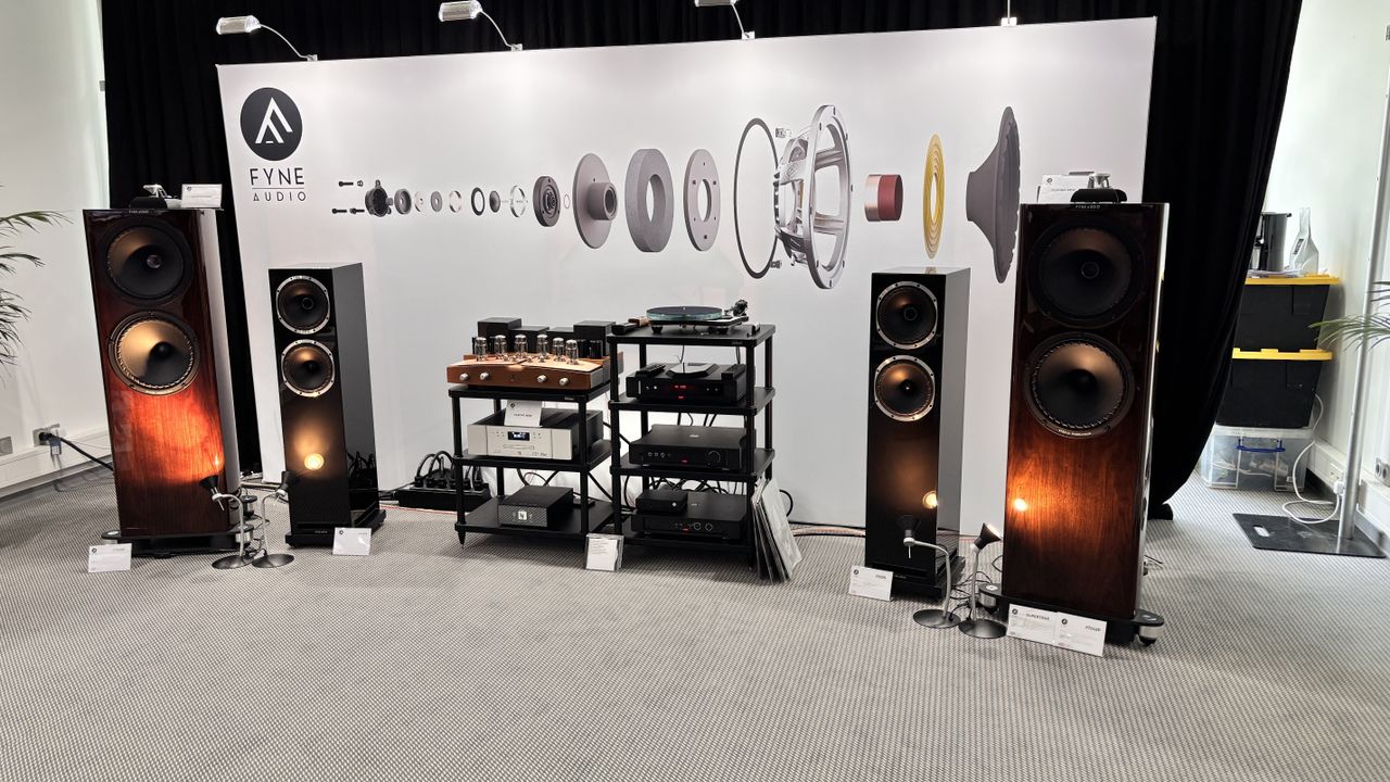 Fyne Audio F704SP floorstanders in a gloss walnut finish