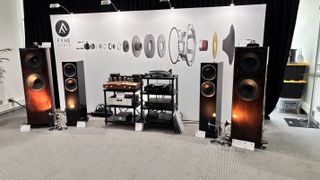 Fyne Audio F704SP floorstanders in a gloss walnut finish