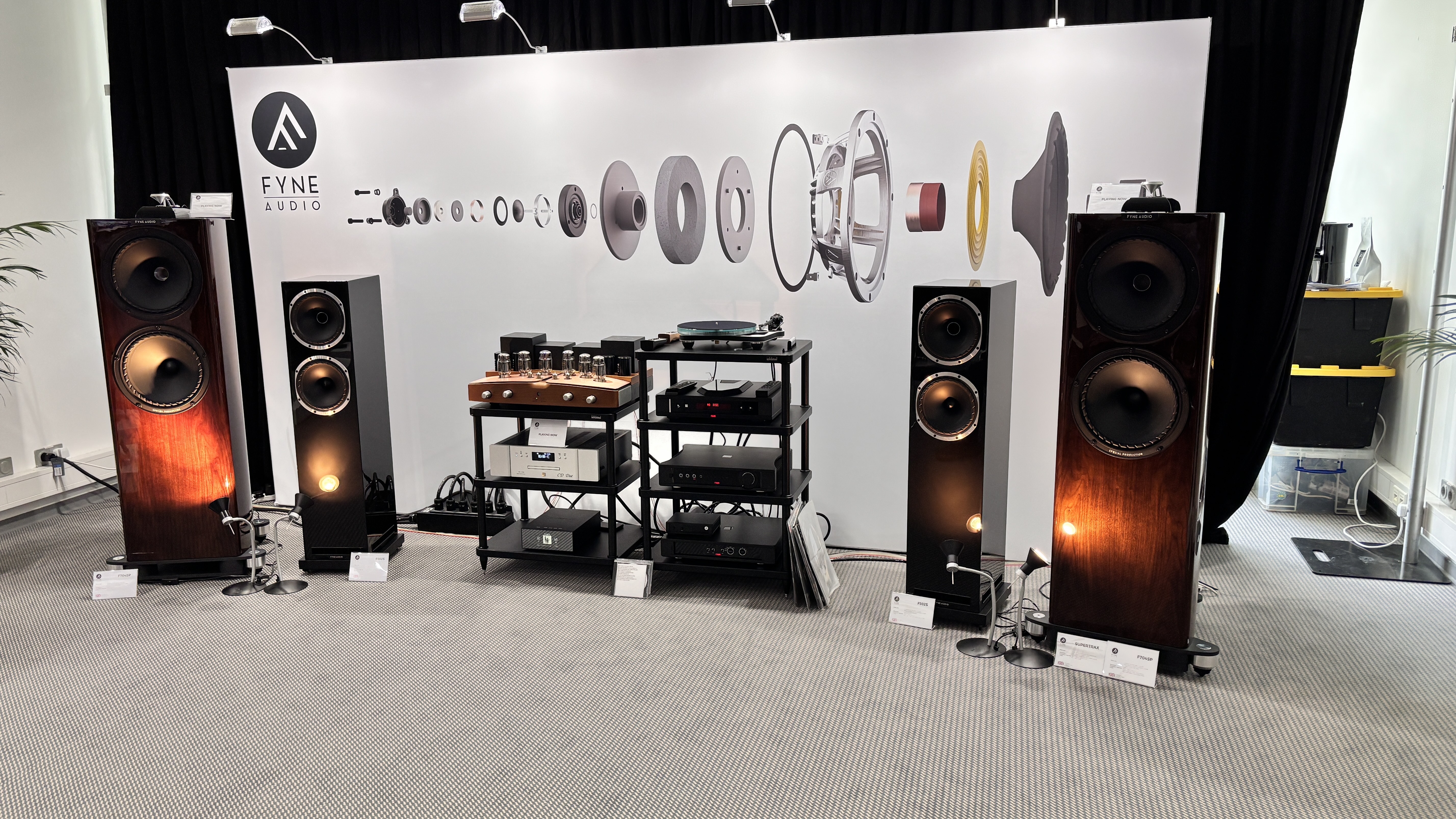 Fyne Audio F704SP floorstanders in a gloss walnut finish