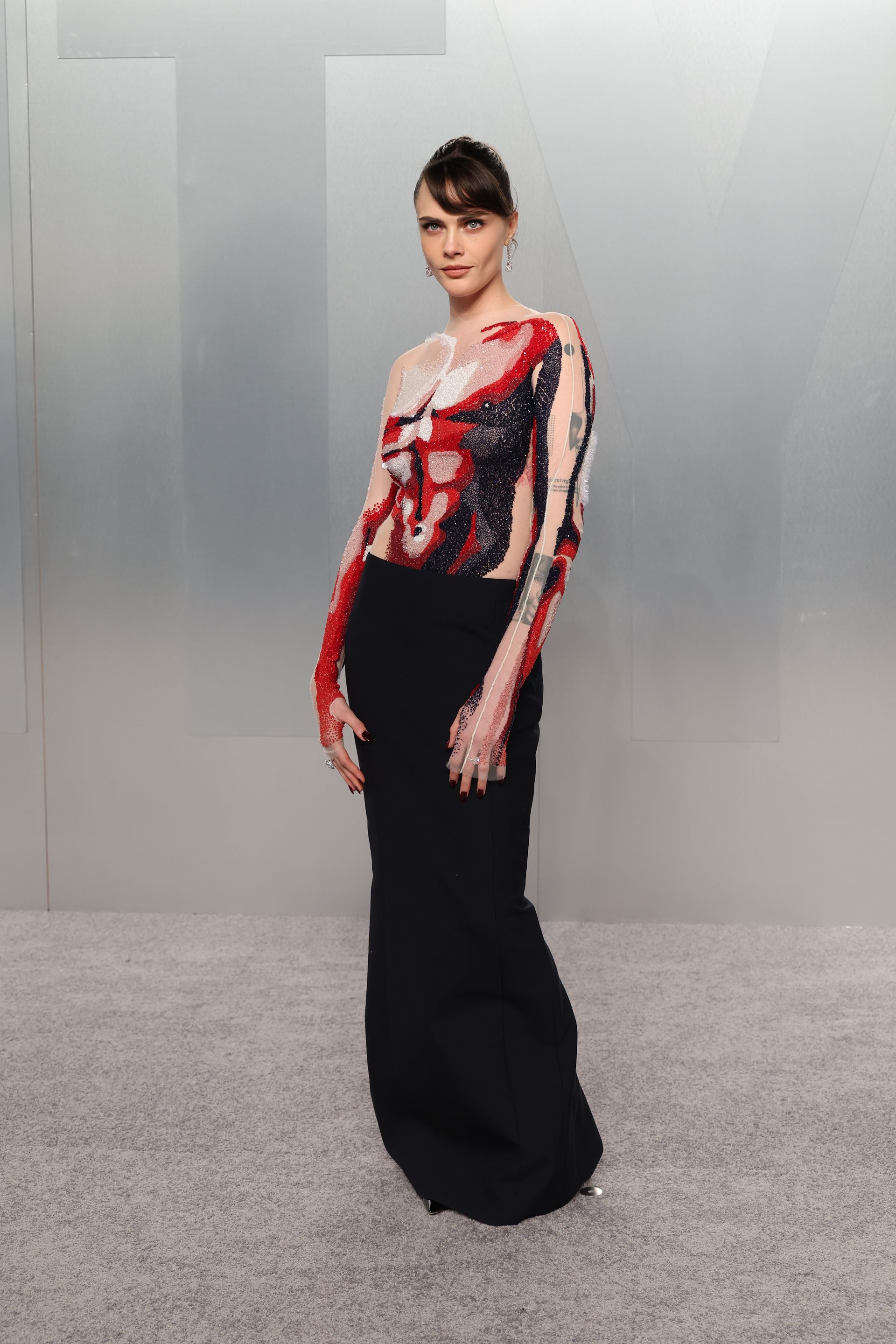 Photo of celebrity at Oscars After-Party 2026 red carpet.