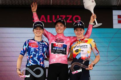 FDJ SUEZ Dutch rider Demi Vollering (C) wearing the overall leader's pink jersey and winner of the Giro d'Italia Women 2026 - Tour of Italy cycling race poses on podium with second placed Canyon SRAM German rider Antonia Niedermaier (L) and third placed SD Worx Dutch rider Anna Van Der Breggen after the 9th stage of the Giro d'Italia Women 2026 - Tour of Italy Women cycling race between Saluzzo and Saluzzo, Italy, on June 7, 2026. (Photo by MARCO BERTORELLO / AFP)