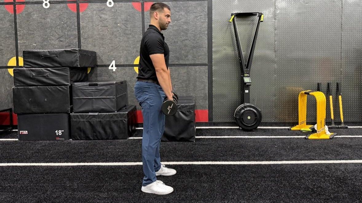 man doing exercise in the gym