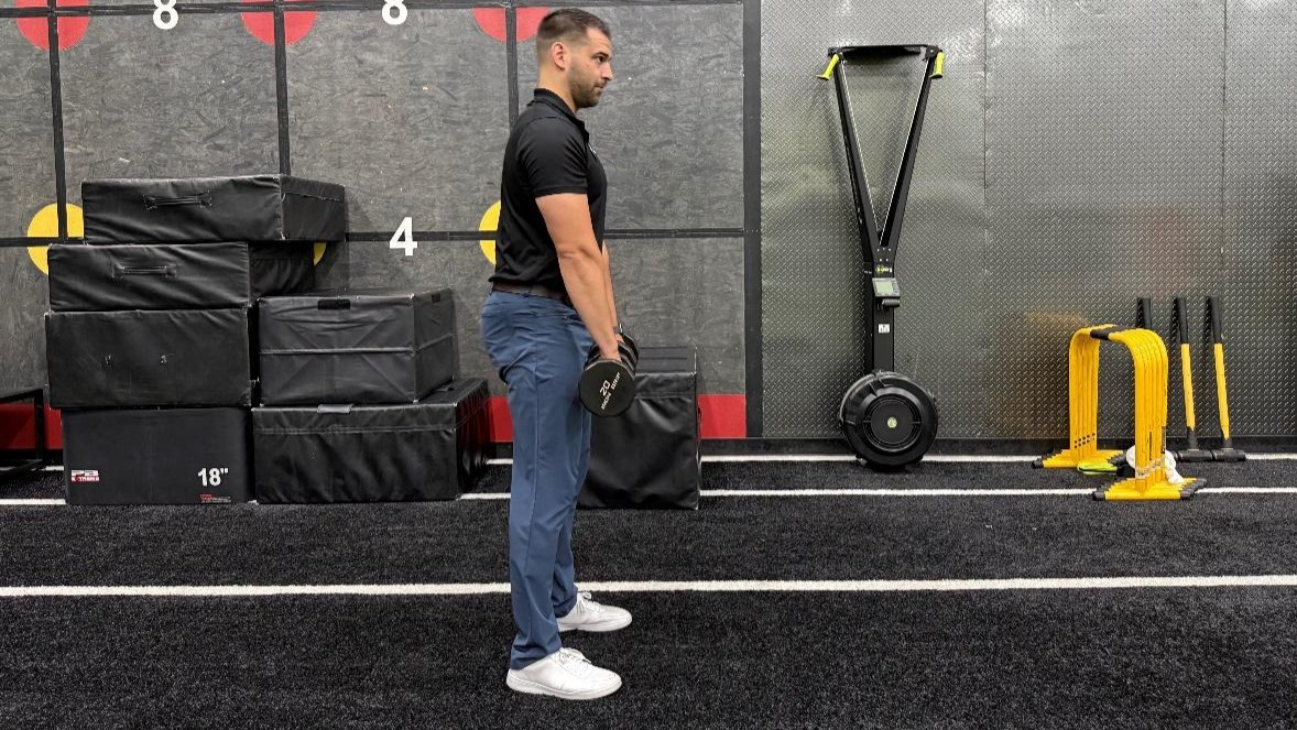 man doing exercise in the gym