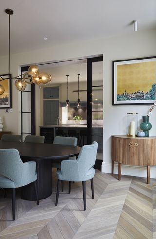 open plan modern kitchen dining room by Violet & George