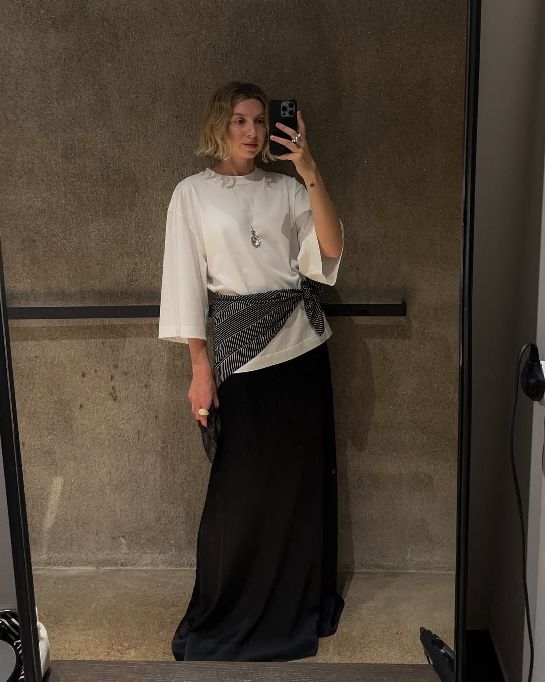 Black maxi skirt, white t-shirt on Brittany