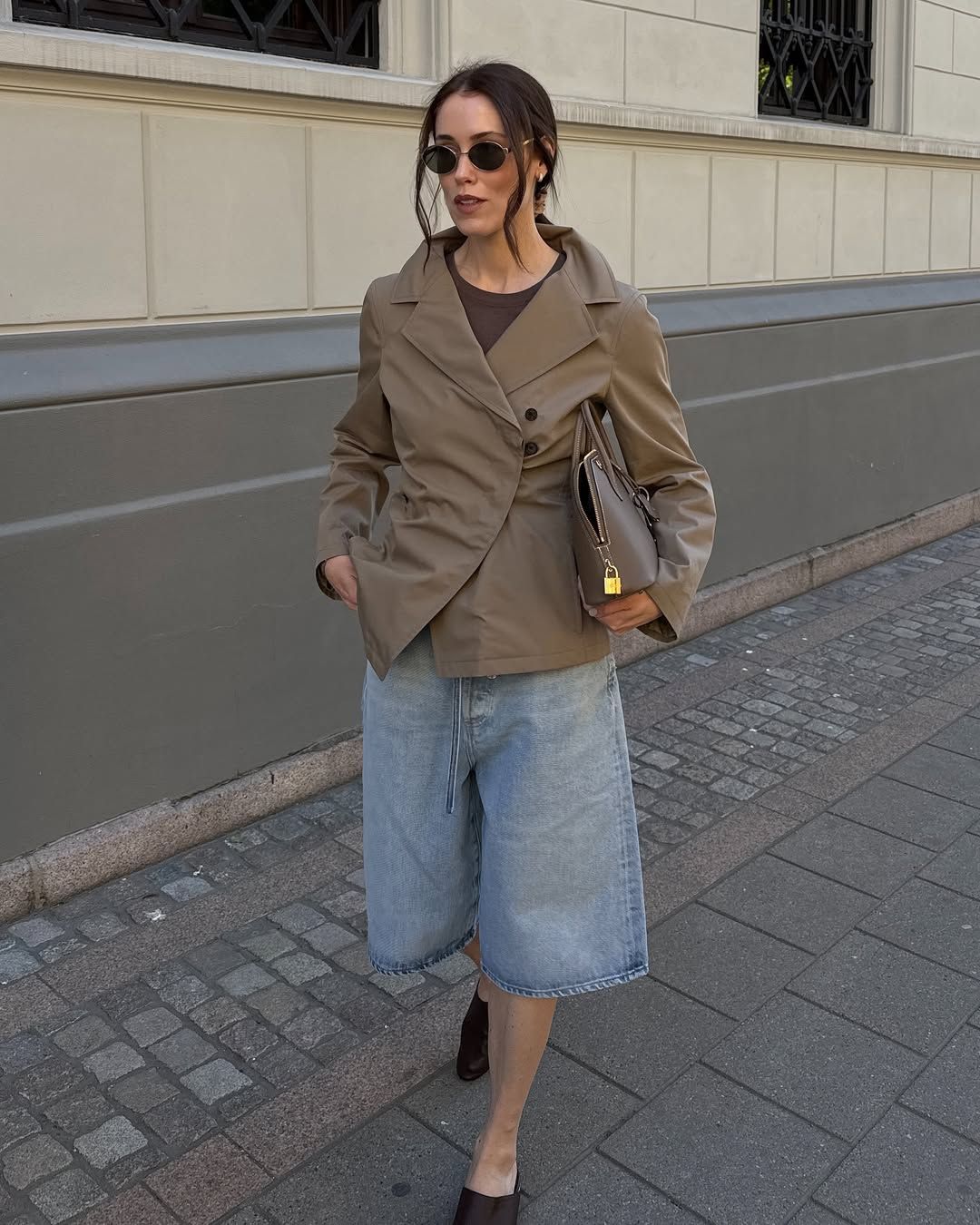 @annabelrosendahl wearing long denim shorts
