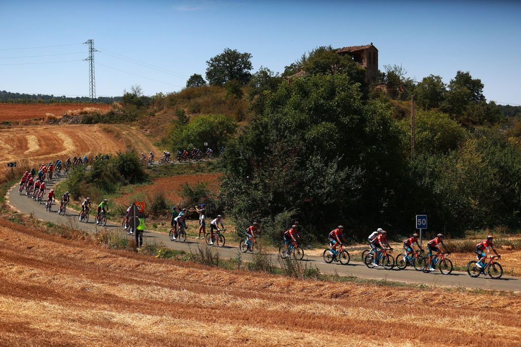 VILLARCAYO SPAIN AUGUST 17 A general view of the peloton passing through a landscape during the 45th Vuelta a Burgos 2023 Stage 3 a 183km stage from Sargentes de la Lora to Villarcayo on August 17 2023 in Villarcayo Spain Photo by Gonzalo Arroyo MorenoGetty Images