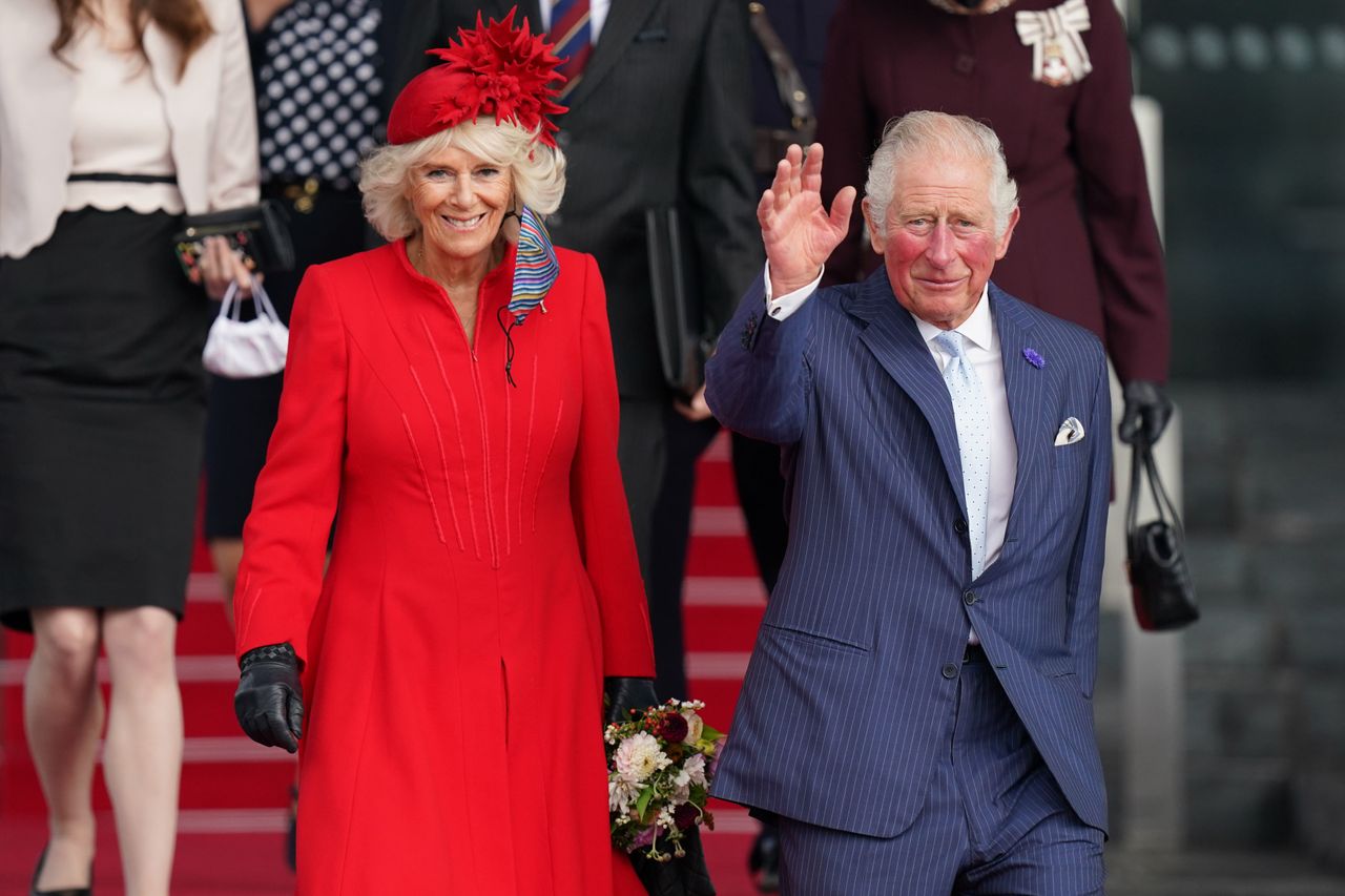 Camilla Parker Bowles and Prince Charles wave