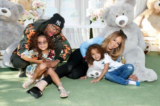 Mariah Carey and Nick Cannon pose with their children Monroe and Moroccan.